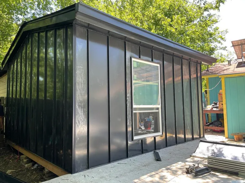 Black standing seam metal wall panels for Metal Roof Installation in Viera East