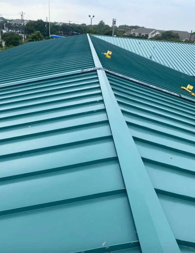 Green commercial metal roof ridge and valley for Metal Roof Repair in Viera East
